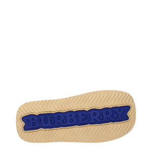 Beigefarbene Lederslipper